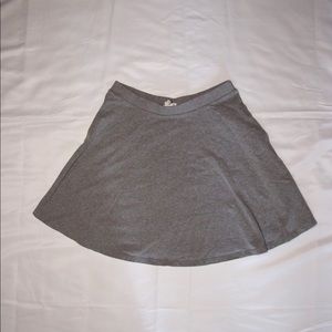 Gray skirt, size medium, and in good condition.